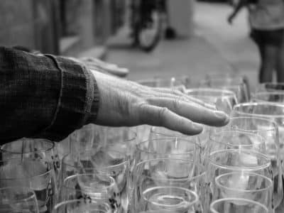 hands playing music using glasses