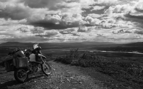 Riding deep into wild lands ... alone