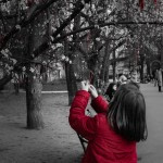 Sofia, Bulgaria: "Martinitsa" is a piece of red and white yarn bought in February and worn until the first flowering trees of spring are seen. At that time, the martinitsa is attached to the tree.
