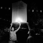 New Year's Eve in Chiang Mai, Thailand. Writing hopes and dreams for the new year on a paper lantern.